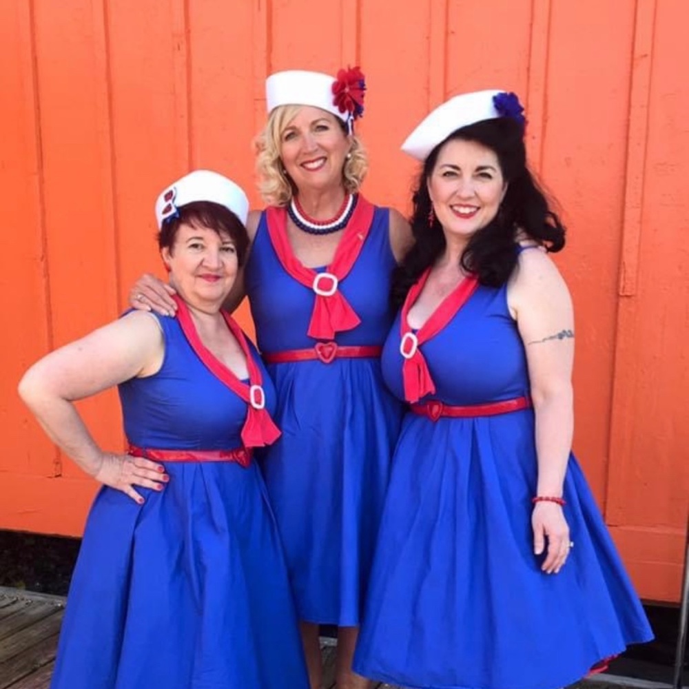 Vintage-Inspired Blue Sailor Dress with Red Trim
